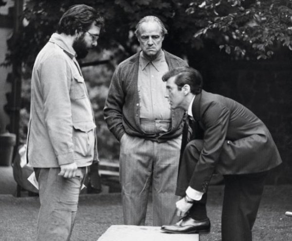 Coppola with his two leading actors. The Godfather would launch Pacino’s film career and revitalize Brando’s.